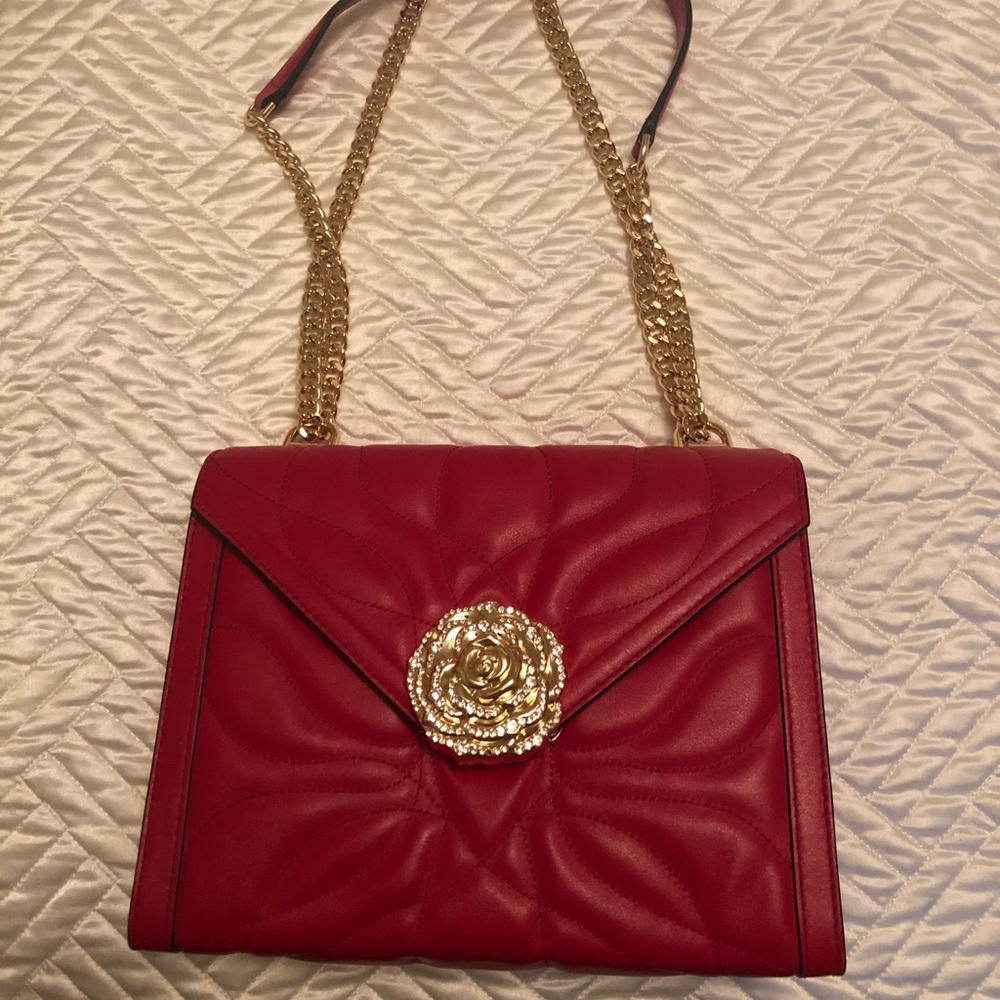 Brand new never worn red quilted Michael kors bag